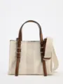 Beige canvas tote handbag featuring brown leather handles and a casual crossbody design. - S / Milky White