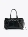 Vintage black leather tote bag with braided handles, side tassels and diagonal front zippers. - L / Black