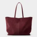 Burgundy suede tote bag detail showing grain texture and long shoulder straps for daily work - L / Burgundy