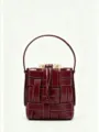 Burgundy leather woven bucket bag featuring a top handle and drawstring fabric interior lining. - Burgundy