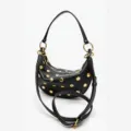 Black crescent shoulder bag with gold dome studs and adjustable strap, stylish and chic. - S / Black