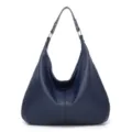 Detail view of the elegant blue hobo shoulder bag featuring soft leather and sturdy metal rings. - Blue
