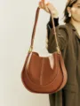 Brown soft leather shoulder saddle bag with contrast stitching and elegant hardware. - L / Brown