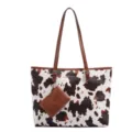 Cow print tote shoulder bag with brown straps and coin purse variant, casual fashion style. - Brown Cow Print