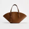 Brown leather handbag with unique fan shape, double top handles and chic minimalist style - Tan
