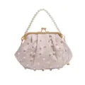 Elegant pink pearl kiss-lock clutch bag with embroidered lace and beaded handle strap. - Pink