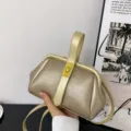 Champagne gold litchi pattern frame handbag, stylish crossbody and shoulder bag for women. - Gold