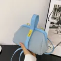 Borsa a mano alla moda in pelle grigia e azzurro chiaro con manico superiore e tracolla - Azzurro