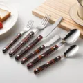 Stainless steel cutlery set with tortoiseshell handles, knife, fork and spoon for home dining use. - Dinner Knife / Leopard Print