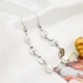 Stainless steel pig nose chain pearl tassel earrings detail view, elegant minimalist jewelry. - Silver