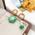 Exquisite asymmetric glass flower and pearl drop earrings with stainless steel twisted hoops. - Green