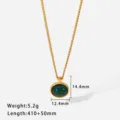 Detailed view of the elegant oval green gemstone pendant necklace with gold plated chain. - Gold Color Green Zirconia