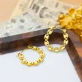 Close-up detail of 18k gold plated stainless steel hoop earrings with unique bean link design. - Coffee Bean Chain / Gold