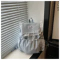 Sac à dos scolaire bleu clair pour filles avec jolis volants en dentelle blanche et étoiles. - Bleu