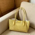 Woven straw beach tote bag detail, stylish cutout design, summer shoulder handbag for women. - Yellow