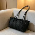 Black woven beach bag detail view, hollow out summer straw tote, casual shoulder handbag. - Black