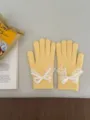 Yellow knitted gloves for women featuring elegant white lace and ribbon bow details. - Lace Bowknot Full Finger Style / Bright yellow