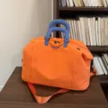 Borsa da viaggio arancione con manici blu, design bicolore casual borsa da palestra fitness. - Arancione