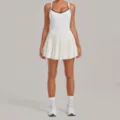 White contrast tennis dress with pleated skirt, sleeveless athletic gym workout activewear. - Ivory