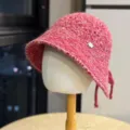 Cozy pink knitted bucket hat with chic side metal tag and lovely stylish ties for women. - Adult 54-60 One Size / Burgundy