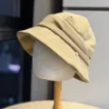 Close-up of khaki pleated bucket hat, short brim design, soft fabric, detailed craftsmanship. - Adult Adjustable 54-60 / Khaki