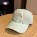 Mint green cotton baseball cap with dimensional YY letter embroidery and classic curved brim design. - Azure Blue