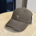 Detail shot of retro washed cotton baseball cap with stylish cursive embroidery for casual wear. - Adult 54-60 Adjustable / Coffee