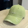 Detail shot of Japanese style distressed washed green baseball cap with front embroidery. - Adult 54-60 Adjustable / Fruit Green