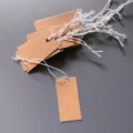Blank kraft paper hang tags with white elastic strings, perfect for DIY writing and price tagging. - 2x4cm / Coffee