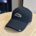 Detailed close-up of a black cotton baseball cap with white california dreaming text. - Adult 54-60 Adjustable / Black