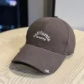 Close-up detail of brown baseball cap featuring white california dreaming embroidery and text. - Adult 54-60 Adjustable / Coffee