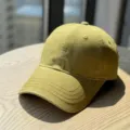 Detailed view of the olive green casual baseball cap featuring fine front embroidery and curved brim. - Adult 54-60 Adjustable / Yellow