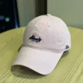 Pink casual soft top baseball cap featuring embroidered front lettering and curved brim. - Adult 54-60 Adjustable / Pink