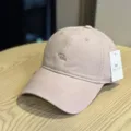 Washed cotton baseball cap with stylish cursive embroidery, casual unisex design for streetwear. - Adult 54-60 Adjustable / Pink