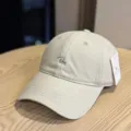 Washed cotton baseball cap for men and women, featuring stylish letter embroidery. - Adult 54-60 Adjustable / Beige