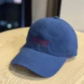 Classic vintage washed cotton baseball cap with red embroidered text for daily wear. - Adult 54-60 Adjustable / Blue