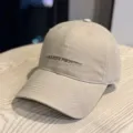 Classic beige baseball cap with front embroidered letters, soft top casual hat for daily wear. - Adult 54-60 Adjustable / Khaki