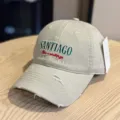 Beige distressed baseball cap with embroidered SANTIAGO text and curved brim for women. - Adult 54-60 Adjustable / Khaki