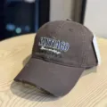 Detailed view of the dark brown distressed embroidered baseball cap featuring stylish text. - Adult 54-60 Adjustable / Coffee