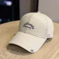 Detail view of the beige vintage baseball cap with California Dreaming embroidery. - Adult 54-60 Adjustable / Beige