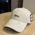 Beige washed cotton baseball cap with embroidered English letters for casual wear. - Adult 54-60 Adjustable / Beige