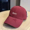 Washed vintage baseball cap for men and women, casual street style cotton dad hat. - Adult 54-60 Adjustable / Burgundy