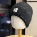 Warm winter knitted beanie hat for women, dark grey fleece cap with pearl decor and number patch. - Adult One Size (54-60cm) / Black