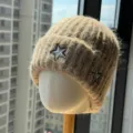 Close-up detail view of the knitted winter beanie featuring stylish star embroidery texture. - Adult One Size (54-60cm) / Khaki