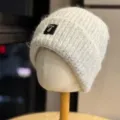 Knit beanie hat for women, thick warm winter cap with metal patch detail, stylish daily wear. - Adult One Size (54-60cm) / Off White