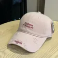 Pink distressed baseball cap with letter embroidery and curved brim for summer casual sun protection. - Adult 54-60 Adjustable / Pink