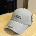 Grey distressed baseball cap with letter embroidery and stylish casual design for summer sun protection. - Adult 54-60 Adjustable / Light Gray