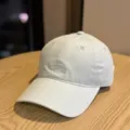 Detailed view of the minimalist Korean style soft-top embroidered baseball cap. - Adult 54-60 Adjustable / Light Blue