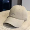 Detailed view of casual beige dad hat with chic front embroidery, perfect for daily wear. - Adult 54-60 Adjustable / Khaki