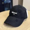 Close-up detail of the black distressed washed baseball cap featuring Kismet star embroidery. - Adult 54-60 Adjustable / Black
